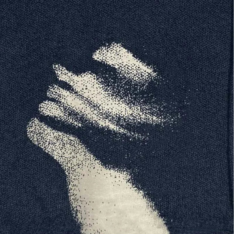 Raised Fist Knit Sweater